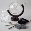 A globe decanter set with two glasses, ice tongs, a funnel, and whiskey stones. Produktbild-Vorschau