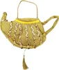 A golden, genie lamp-shaped handbag decorated with sequins, shown against a white background. Produktbild-Vorschau