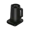 A black electric kettle on its charging base, photographed against a white background. Podgląd zdjęcia produktu