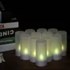 A group of LED tea lights are arranged on a wooden surface, with books in the background. Náhled obrázku produktu