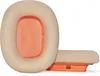 Two ear pads for headphones, one on top of the other, against a white background. Produktbild-Vorschau