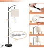 An instructional diagram showing how to assemble a floor lamp, with a separate image of the lamp itself. Produktbild-Vorschau