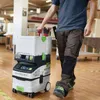 A person is walking in a workshop, pulling a tool box on wheels. Anteprima dell’immagine prodotto