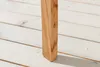A close-up view of a wooden chair leg resting on a light-colored wooden floor. Produktbild-Vorschau