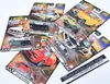 Several Hot Wheels premium die-cast car models in their original packaging are laid out on a white surface. Voir les images du produit