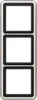 A vertical image of a three-gang light switch frame with blank white inserts. Náhled obrázku produktu