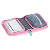 An open pink pencil case with a gray pouch inside. Náhľad obrázku produktu