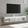 A white TV stand with shelves is mounted on a gray wall below a black television. Produktbild-Vorschau