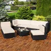 An outdoor lounge set on a wooden deck with a garden and pond in the background. Anteprima dell’immagine prodotto