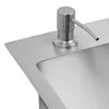 A close-up view of a stainless steel sink with a soap dispenser. Podgląd zdjęcia produktu