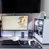 A gaming setup with a computer, monitor, keyboard, mouse, headphones, and controller. Anteprima dell’immagine prodotto
