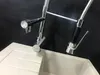 A close-up shot of a kitchen faucet over a sink. Náhled obrázku produktu