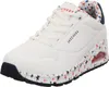 A single white sneaker with red and blue star patterns on the sole and inner lining. Voir les images du produit