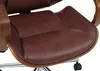 A close-up view of the seat of a brown leather office chair. Anteprima dell’immagine prodotto