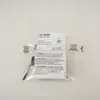 A product in a clear plastic bag with a label. Produktbild-Vorschau