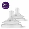 Two clear baby bottle nipples on a white background. Voir les images du produit