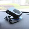 A black car heater/cooler is placed on the dashboard of a car. Náhľad obrázku produktu