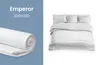 A split image showing a rolled-up mattress topper on the left and a made bed with white bedding on the right. Náhľad obrázku produktu