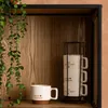 Zestaw 4 porcelanowych kubków HELLO na metalowym stojaku, 4 Podgląd zdjęcia produktu 6