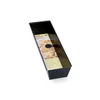 A black loaf pan with a product label attached. Produktbild-Vorschau