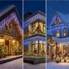 Collage of three houses decorated with blue icicle lights and Christmas wreaths for the holidays. Produktbild-Vorschau