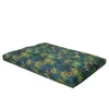 A single cushion with a tropical leaf pattern on a white background. Náhled obrázku produktu
