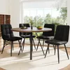 A dining set with a round table and four chairs in a well-lit room with a large window. Anteprima dell’immagine prodotto