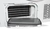 A close-up view of the lint filter and condenser of a white dryer. Produktbild-Vorschau
