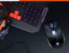A gaming mouse and part of a keyboard with headphones, arranged on a dark surface. Náhľad obrázku produktu