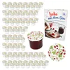 A collection of small glass jars with strawberry-themed lids, a jar filled with jam, and a recipe book about making preserves. Produktbild-Vorschau