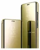 Two gold-colored phone cases are displayed against a white background. One case is open, showing the screen with the time and date displayed. The other case is closed, and a smaller, partially opened case is placed in front of it. Produktbild-Vorschau