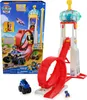 A Paw Patrol toy playset with a tower and loop-de-loop track, shown with its packaging. Náhľad obrázku produktu