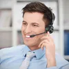 A man wearing a headset and smiling, likely in an office or home office setting. Produktbild-Vorschau
