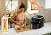 A woman is preparing food in a kitchen, with an air fryer and marketing graphics visible. Náhled obrázku produktu