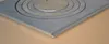 A close-up view of a cast iron stove plate with concentric rings. Náhľad obrázku produktu