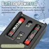 Close-up view of the battery compartment of a digital scale, showing two AA batteries installed. Text overlays provide information about battery power and auto power-off feature. Náhľad obrázku produktu