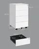 A diagram showing the dimensions of a white rolling cabinet with drawers, and a separate diagram of an open drawer with its dimensions. Anteprima dell’immagine prodotto