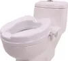 A white toilet seat riser is attached to a white toilet. Náhled obrázku produktu
