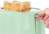 A hand is shown pressing the lever of a green toaster with two slices of toast inside. Podgląd zdjęcia produktu