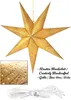 A golden paper star lantern is shown hanging against a white background, with a close-up inset of the lantern's texture and a separate image of its power cord and plug. Náhled obrázku produktu