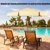 A poolside scene with lounge chairs and a large umbrella. Voir les images du produit
