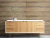 A sideboard with drawers and doors in front of a wood-paneled wall. Anteprima dell’immagine prodotto