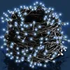 A tangled ball of white LED string lights against a dark blue background. Produktbild-Vorschau