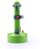 A green electric peeler on a white background. Produktbild-Vorschau
