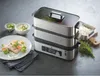 A steaming appliance with food prepared and ready to serve. Náhľad obrázku produktu