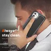 A man is holding a phone with a case while talking on it. The background is blurred. Produktbild-Vorschau