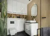 A modern bathroom with a vanity, sink, mirror, toilet, and storage cabinets. Podgląd zdjęcia produktu