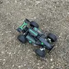 A remote-controlled car is shown on a dirt and gravel surface. Náhľad obrázku produktu