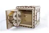 A wooden 3D puzzle safe with the door open, showing a dollar sign on the inside of the door. Produktbild-Vorschau
