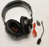 A pair of black gaming headphones with red accents, along with their accessories, laid out on a white background. Produktbild-Vorschau